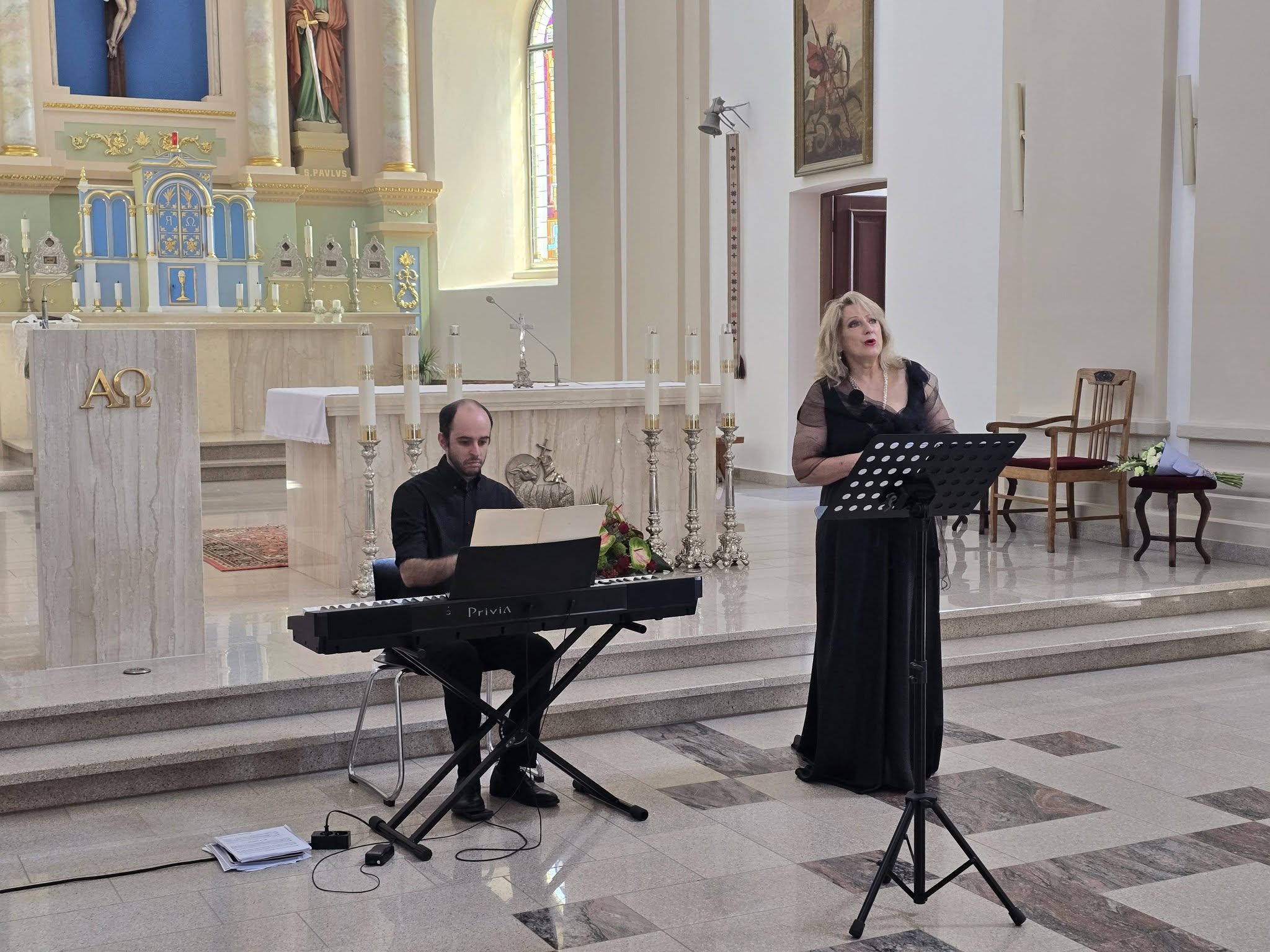 Muzika, sujungusi Italiją ir Molėtus: bažnyčios skliautus užliejo jubiliejinio festivalio akordai